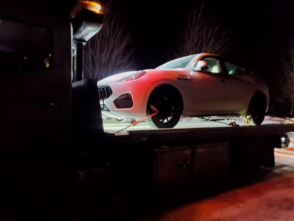 white car has flatbed